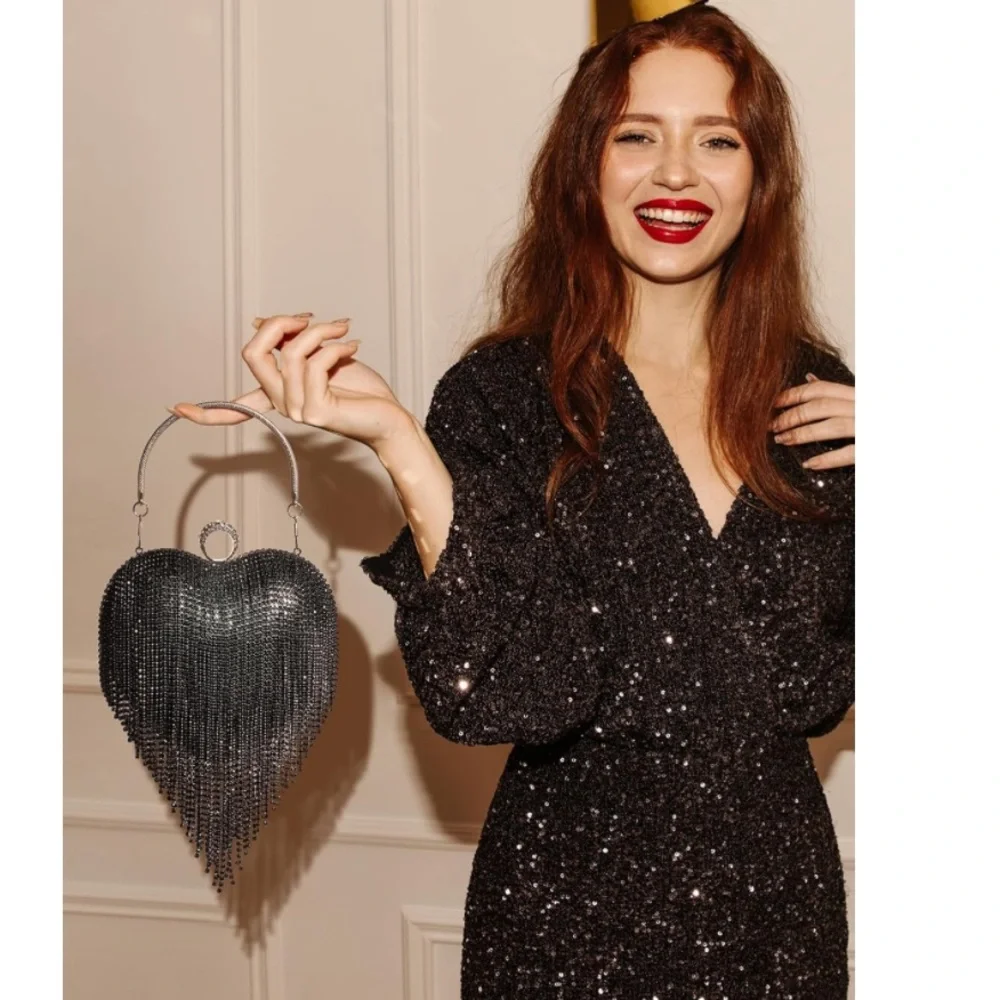 Dazzling heart-shaped clutch bag
